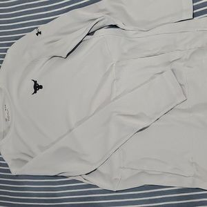 Light Grey Project Rock long sleeve tee with pocket in front. Size medium